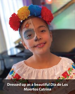 a girl with a clown hat