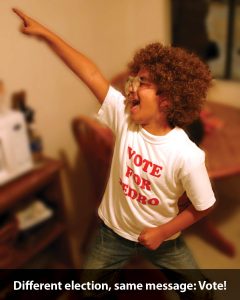 a boy with his hands up