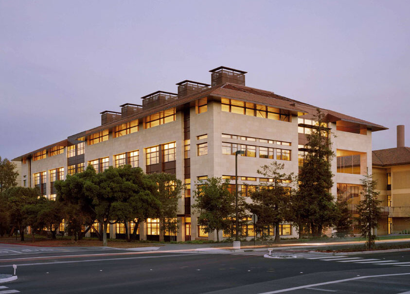 a large building with lights on at night